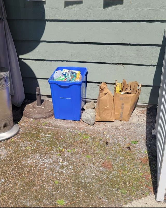 Patio corner after: litter cleared and recycling organized